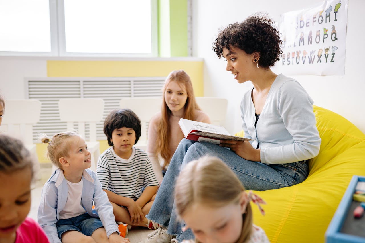 Caring educator working with young children